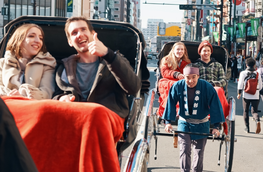 Foreign tourists on a rickshaw